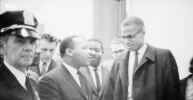 Martin Luther King Jr. and Malcolm X wait for a press conference to begin in an unknown location, March 26, 1964. (Library of Congress/Marion S. Trikosko/Handout via Reuters)