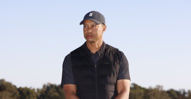 Tiger Woods at the trophy ceremony on the practice green after the final round of the Genesis Invitational golf tournament at Riviera Country Club, Los Angeles, California, Feb. 21, 2021. (AP Photo)