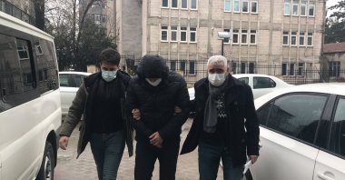 A FETÖ member is taken into custody in Samsun, Turkey, Feb.16, 2021. (AA)