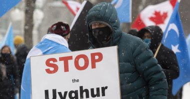 Protesters gather outside the Parliament buildings in Ottawa, Ontario Monday, Feb. 22, 2021. (AP)