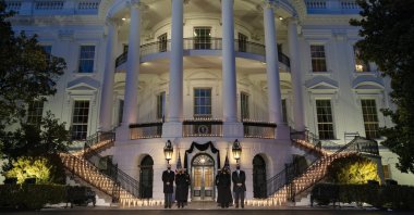 From left to right, U.S. President Joe Biden, First Lady Jill Biden, Vice President Kamala Harris and second gentleman of the U.S. Doug Emhoff participate in a moment of silence during a ceremony to honor the coronavirus victims, at the White House, Washington, D.C., U.S., Feb. 22, 2021. (AP Photo)