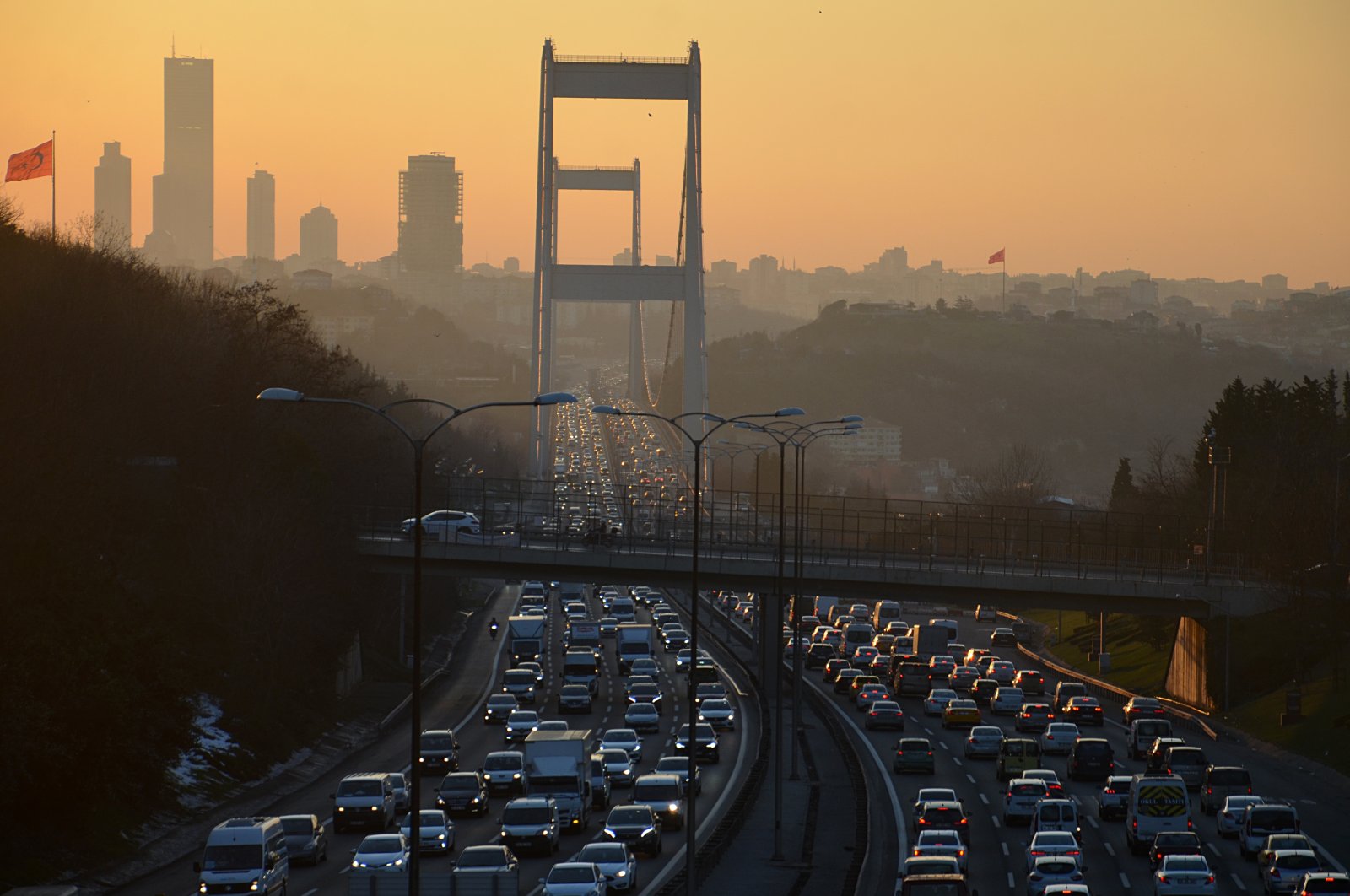 Traffic congestion on Fatih Sultan Mehmet Bridge hours before a curfew, in Istanbul, Turkey, Feb. 22, 2021. (AA Photo)