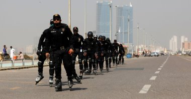 Special Security Unit (SSU) police members rollerblade during practice along the seafront in Karachi, Pakistan, Feb. 19, 2021. (Reuters Photo)