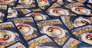 The back side of Pokemon trading cards can be seen, New York City, USA, July 12, 2016. (Shutterstock Photo)