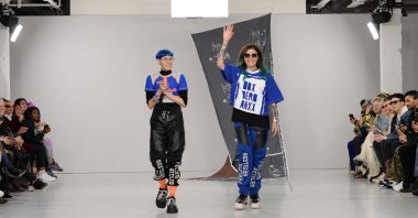 Designers Begüm Berdan (L) and Deniz Berdan walk the runway at the DB Berdan show during London Fashion Week at the Fashion Scout Venue on February 15, 2020 in London, England. (Getty Images for BFC)