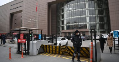 A security member stands guard in front of the Bakırköy courthouse, Istanbul, Turkey, Feb. 24, 2021. (AFP Photo)