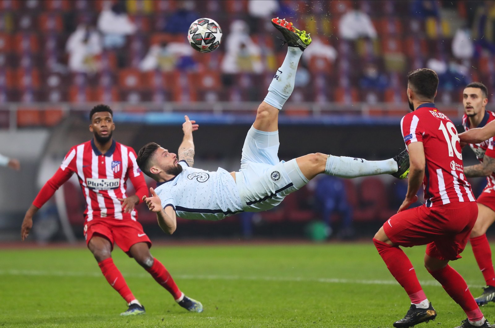 Chelsea's Olivier Giroud scores his side's only goal against Atletico Madrid in the UEFA Champions League last 16 match at the Arena Nationala, Bucharest, Romania, Feb. 23, 2021.