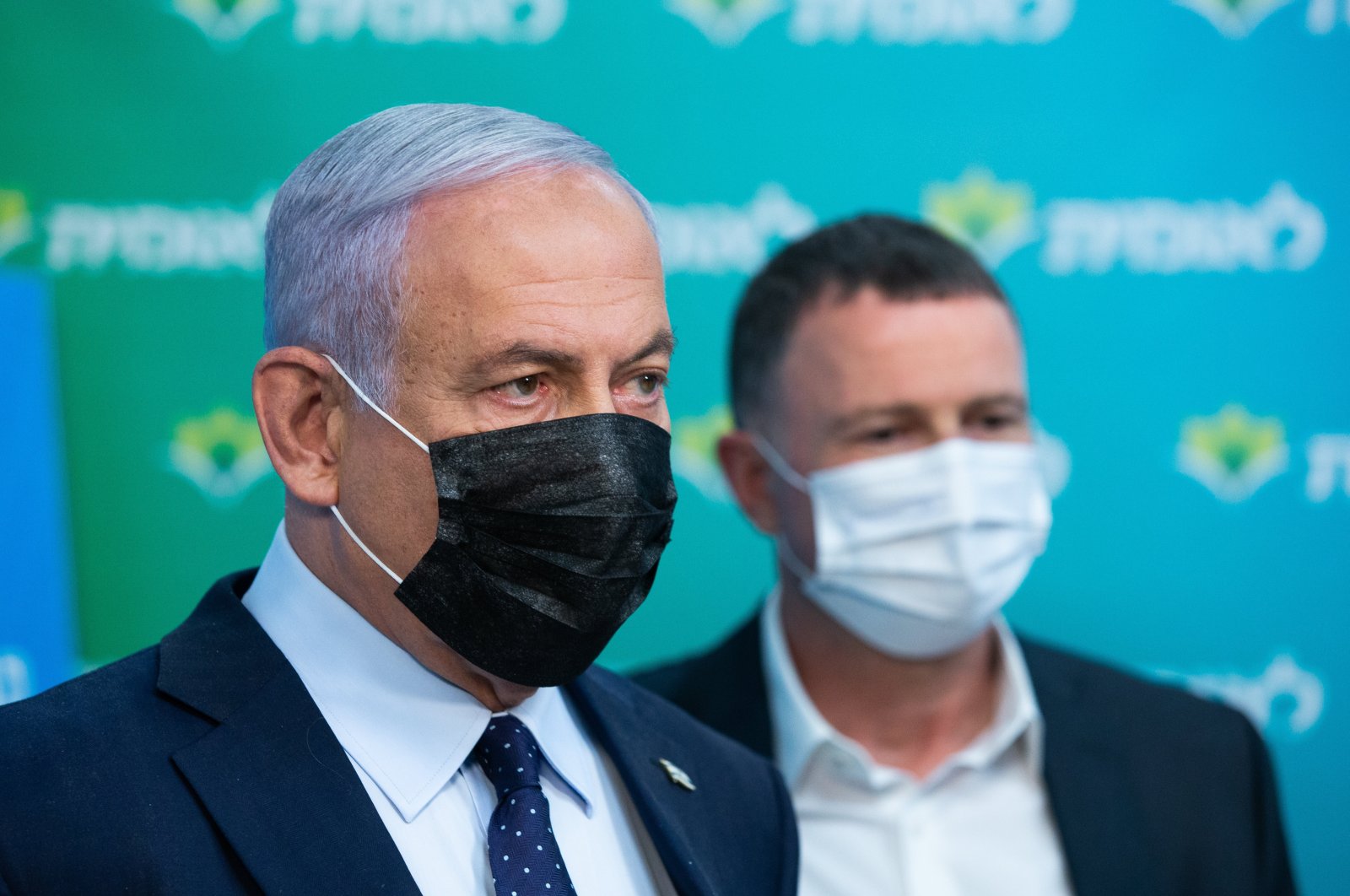 Israeli Prime Minister Benjamin Netanyahu (L) during his visit to the Leumit Health Care Services vaccination facility in Jerusalem, Israel, Feb. 16, 2021. (EPA-EFE Photo)