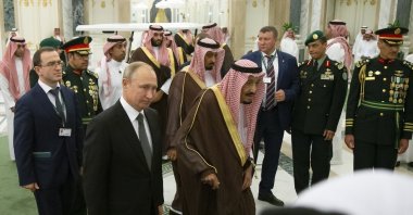 Russian President Vladimir Putin (2nd L) and Saudi King Salman (C) arrive for talks in Riyadh, Saudi Arabia, Oct. 14, 2019. (AP Photo)