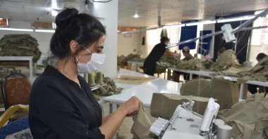 An employee seen in a textile factory in Şırnak province, southeastern Turkey, Feb. 25, 2021. (AA Photo)