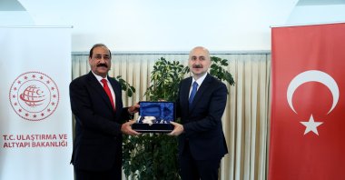 Iraqi Transportation and Infrastructure Minister Nasser Hussein Bandar (L) and his Turkish counterpart Adil Karaismailoğlu ahead of their meeting in Istanbul, Turkey, Feb. 25, 2021. (AA Photo)