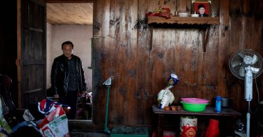 A farmer at his residence in Baojing County, in central Hunan province, China, Jan. 12, 2021. (AFP Photo)