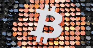 The logo of the Bitcoin digital currency is seen in a shop in Marseille, France, Feb. 7, 2021. (Reuters Photo)