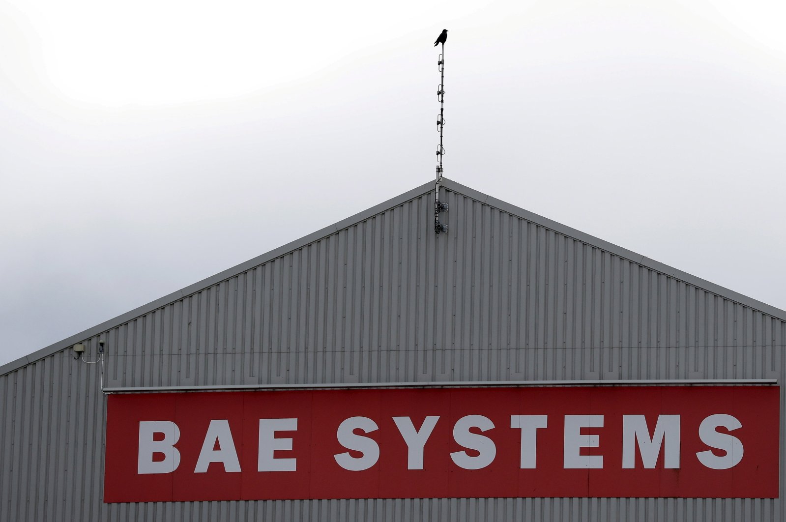A sign adorns a hangar at the BAE Systems facility at Salmesbury, near Preston, northern England, March 10, 2016.  (Reuters Photo)
