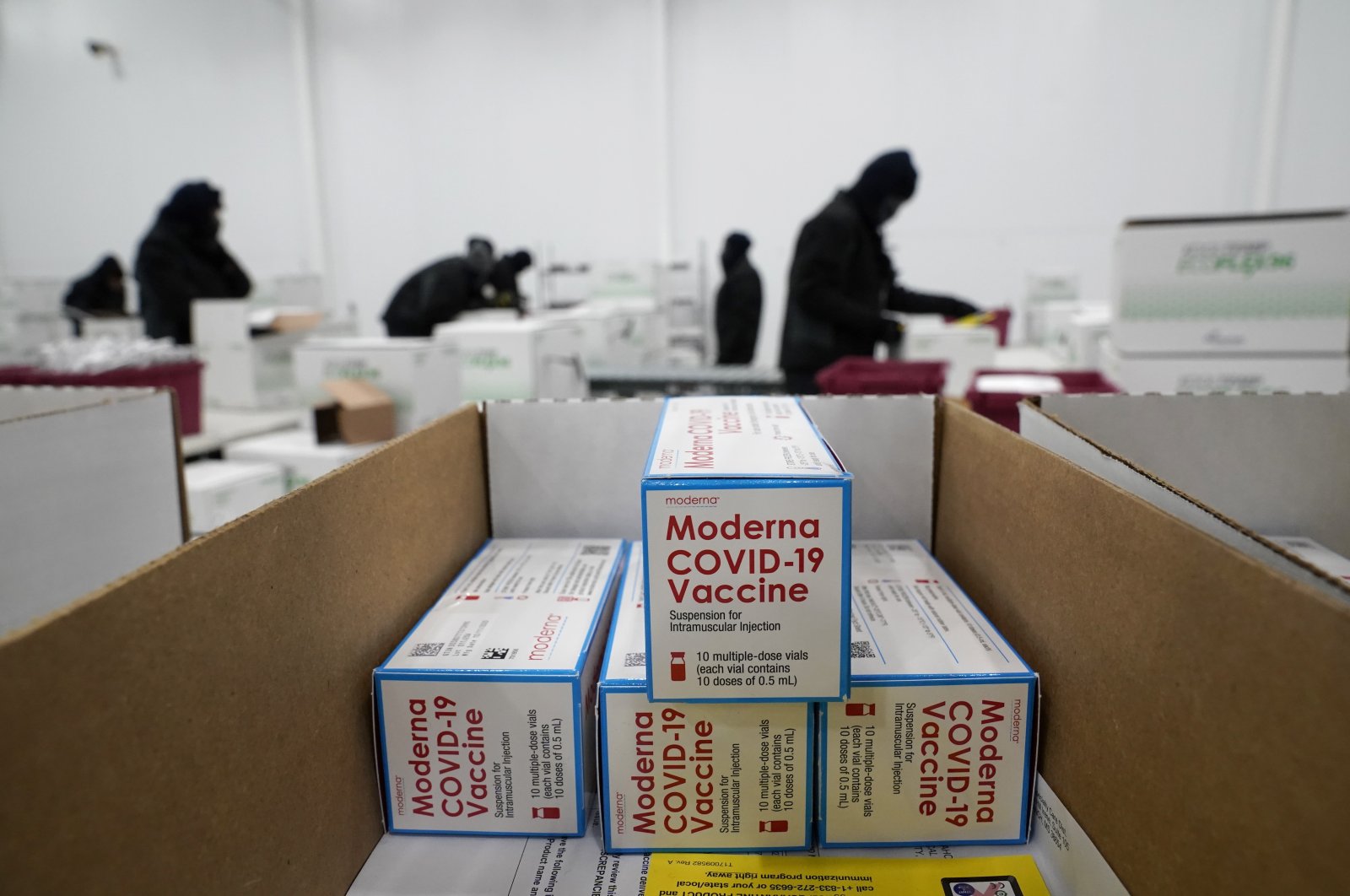 Boxes containing the Moderna COVID-19 vaccine are prepared to be shipped at the McKesson distribution center in Olive Branch, Mississipi, U.S., Dec. 20, 2020. (AP Photo)