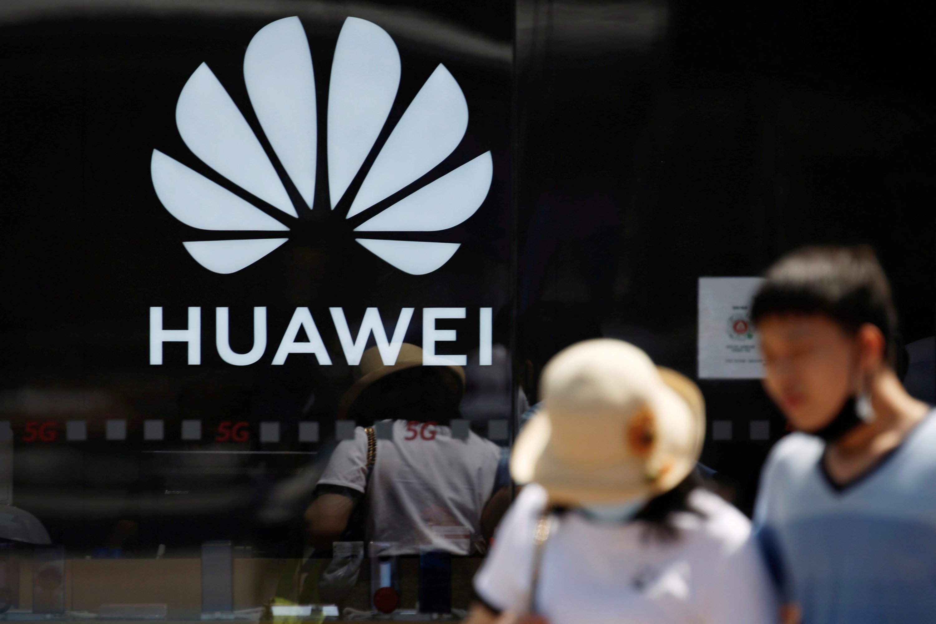 Reeling from US sanctions, China's Huawei plans foray into EVs | Daily Sabah