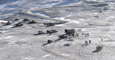 This undated handout photograph released by the Indian Army shows Chinese People Liberation Army (PLA) soldiers and tanks during military disengagement along the Line of Actual Control (LAC) at the India-China border in Ladakh, Feb. 16, 2021. (AFP Photo)