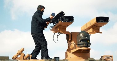 Company staff place missiles into the Sungur air defense system's launcher pods for test firing in this photo provided on Feb. 26, 2021. (DHA Photo)