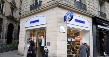 Pedestrians walk past a Birkenstock outlet in Paris, France, Feb. 26, 2021. (AFP Photo)