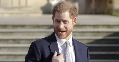 Britain's Prince Harry gestures in the gardens of Buckingham Palace in London, England, Jan. 16, 2020. (AP Photo)