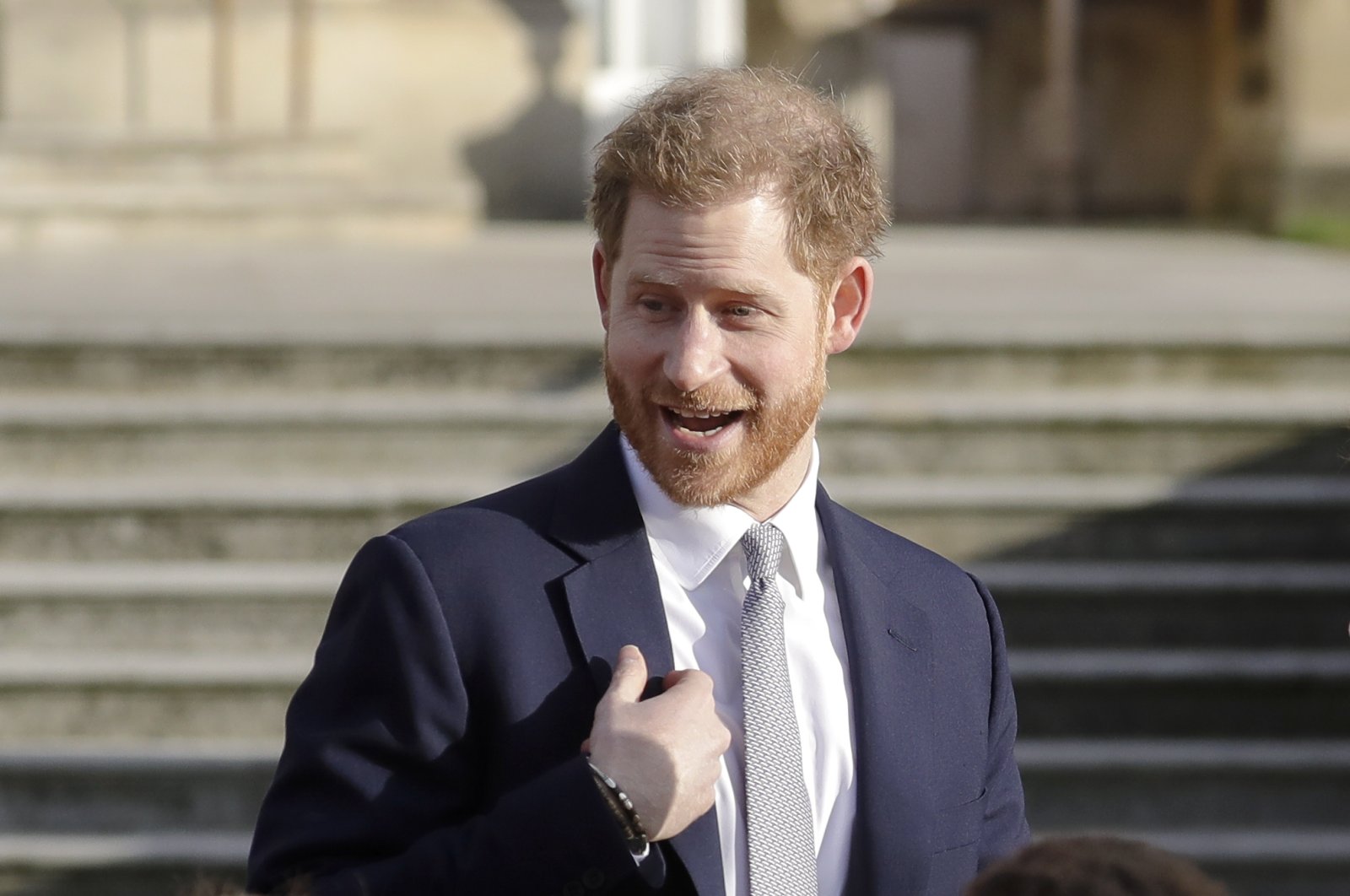 Britain's Prince Harry gestures in the gardens of Buckingham Palace in London, England, Jan. 16, 2020. (AP Photo)