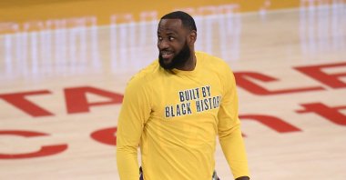 LeBron James of the Los Angeles Lakers smiles as he warms up before an NBA basketball game against the Portland Trail Blazers, in Los Angeles, California, Feb. 26, 2021. (AFP Photo)