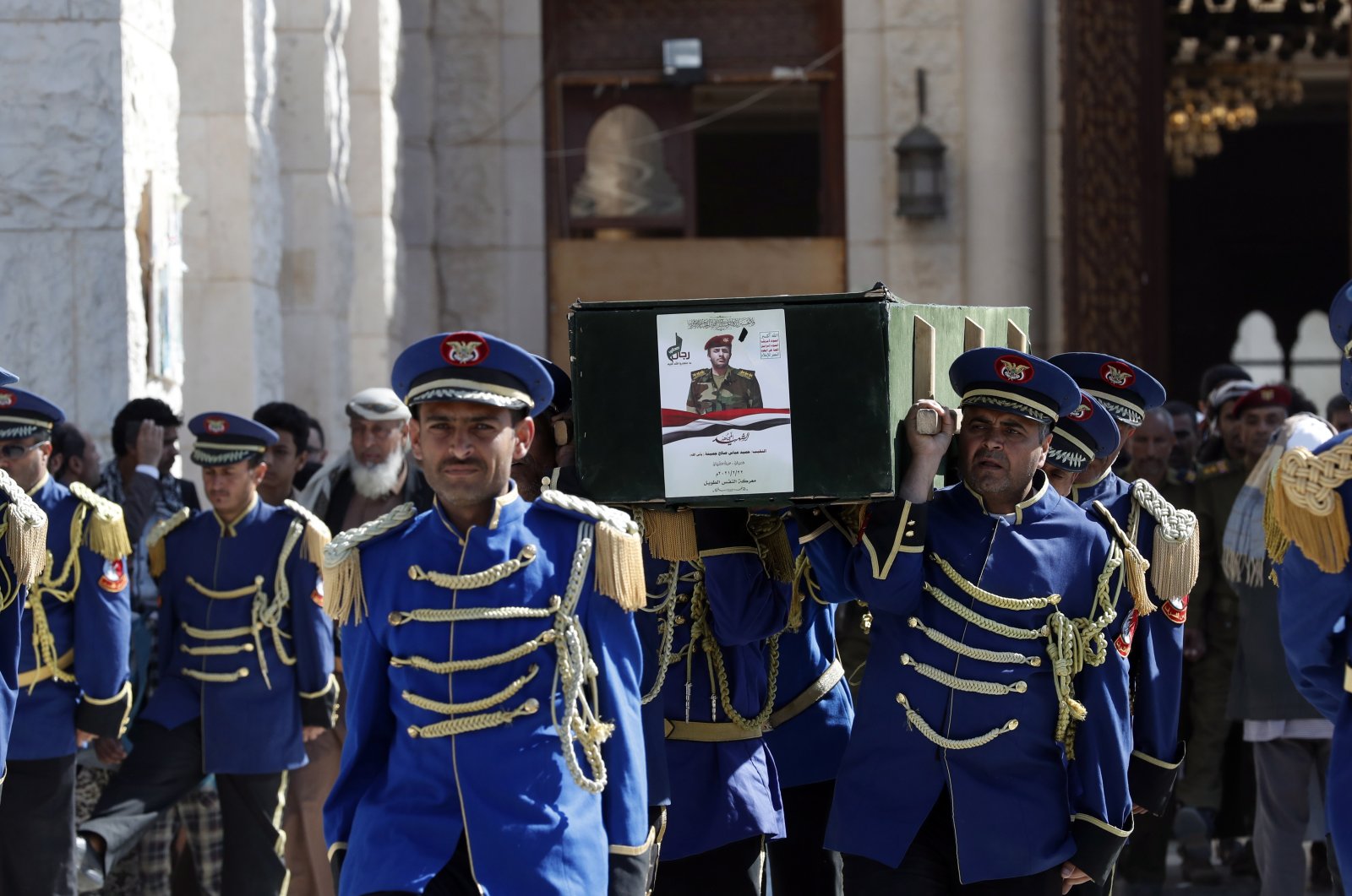 Members of Yemeni honor guard carry the coffin of a slain Houthi fighter during a funeral procession in Sanaa, Yemen, Feb. 24, 2021. (EPA Photo)