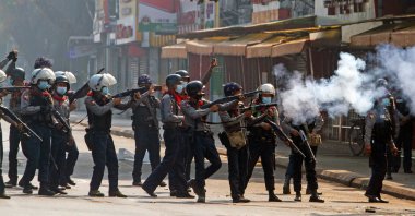Riot police officers fire tear gas canisters during a protest against the military coup in Yangon, Myanmar, Feb. 28, 2021. (Reuters Photo)