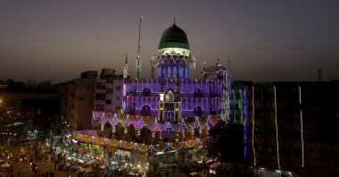 A mosque is decorated with lights for the Mawlid an-Nabi holiday celebrating the birthday of the Prophet Muhammad, in Karachi, Pakistan, Oct. 25, 2020. (AP Photo)