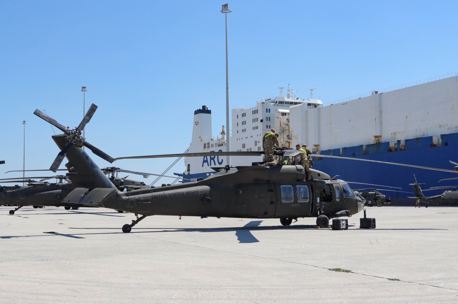 U.S. Army troops assemble and fix their helicopters after unloading them from the ARC ship at the port of Alexandroupoli (Dedeağaç), Greece, July 23, 2020. (Photo by Getty Images)
