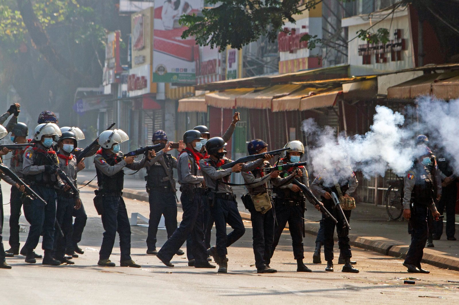 Riot police officers fire tear gas canisters during a protest against the military coup in Yangon, Myanmar, Feb. 28, 2021. (Reuters Photo)