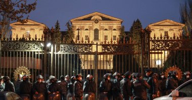 Police officers gather outside the National Assembly Building during a protest calling for the resignation of the Armenian government, Yerevan, Armenia, Dec. 9, 2020.