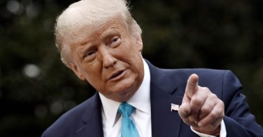 Former U.S. President Donald Trump speaks to reporters as he makes his way to board Marine One from the South Lawn of the White House in Washington, Sept. 26, 2020. (AFP File Photo)