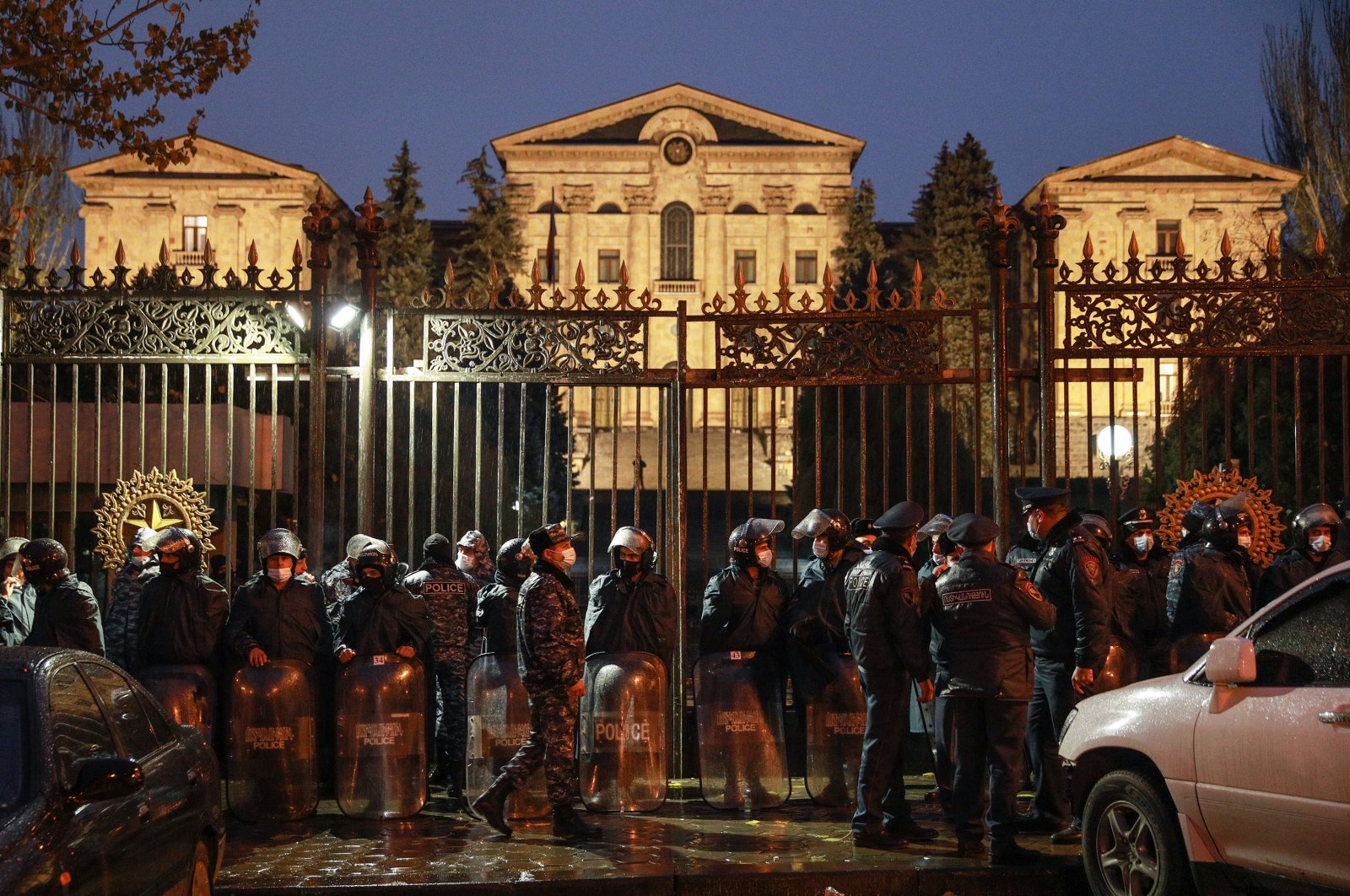 Police officers gather outside the National Assembly Building during a protest calling for the resignation of the Armenian government, Yerevan, Armenia, Dec. 9, 2020.