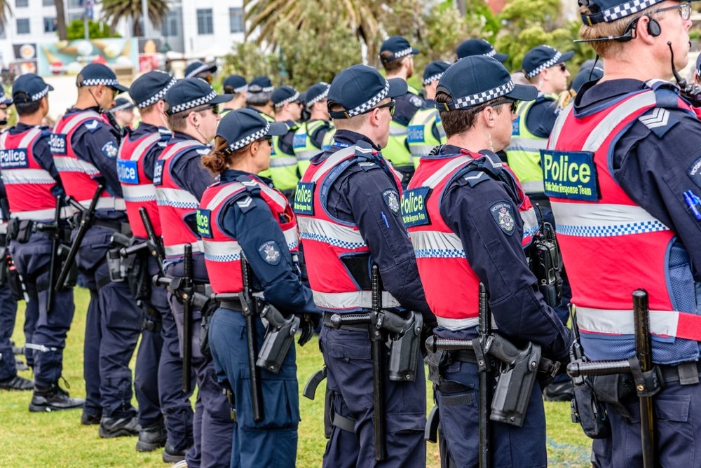 Police stand guard as left and right-wing political groups face off against each other at St. Kilda beach, Melbourne, Australia, Jan. 5, 2019. (Shutterstock Photo)