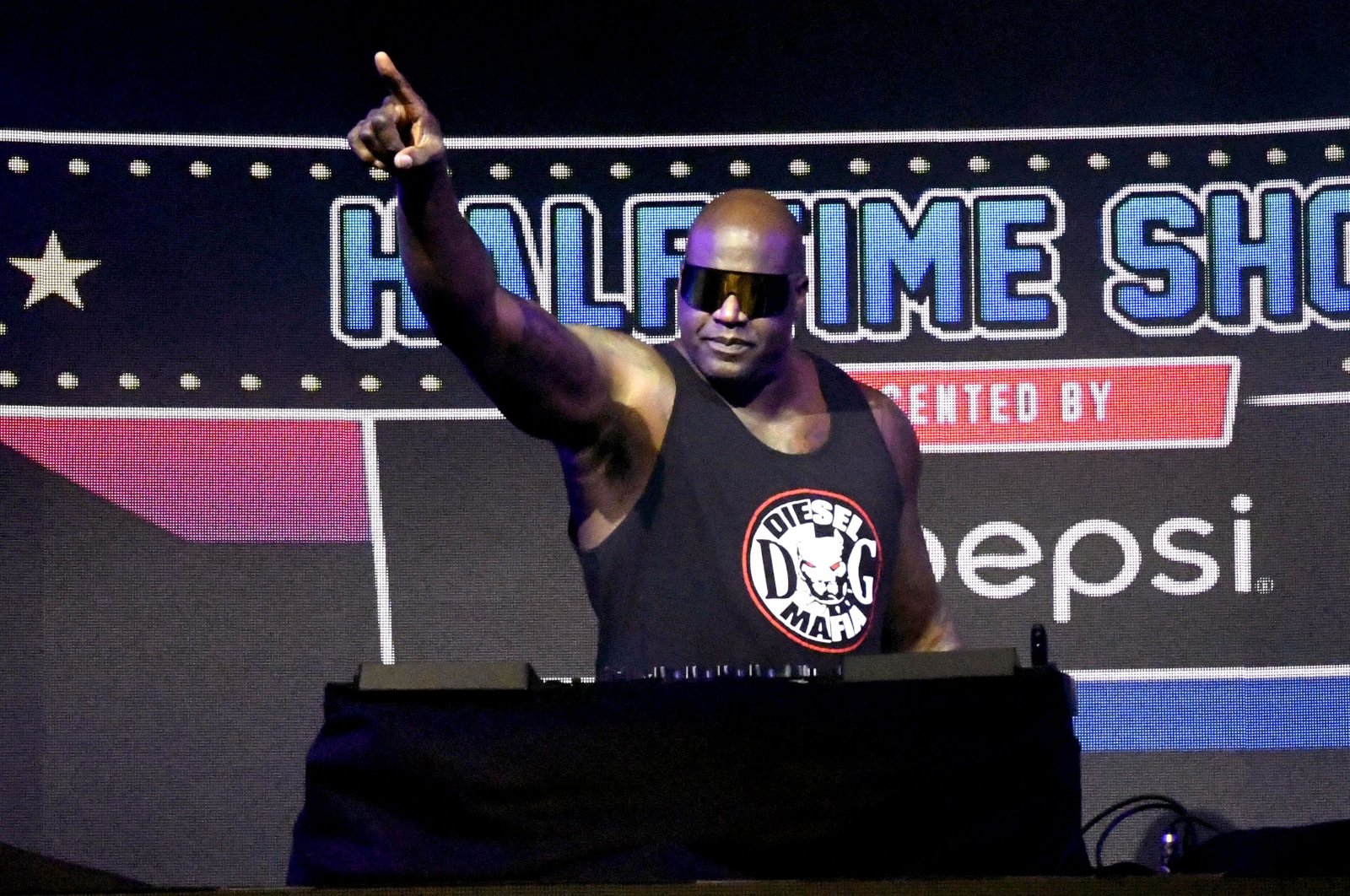 Shaquille O'Neal performs as DJ Diesel at The SHAQ Bowl for Super Bowl LV, in Tampa, Florida, Feb. 07, 2021. (AFP Photo)
