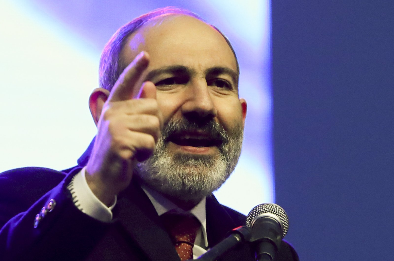 Armenian Prime Minister Nikol Pashinian gestures while addressing his supporters during a rally in his support in the center of Yerevan, Armenia, Monday, March 1, 2021. (AP Photo)