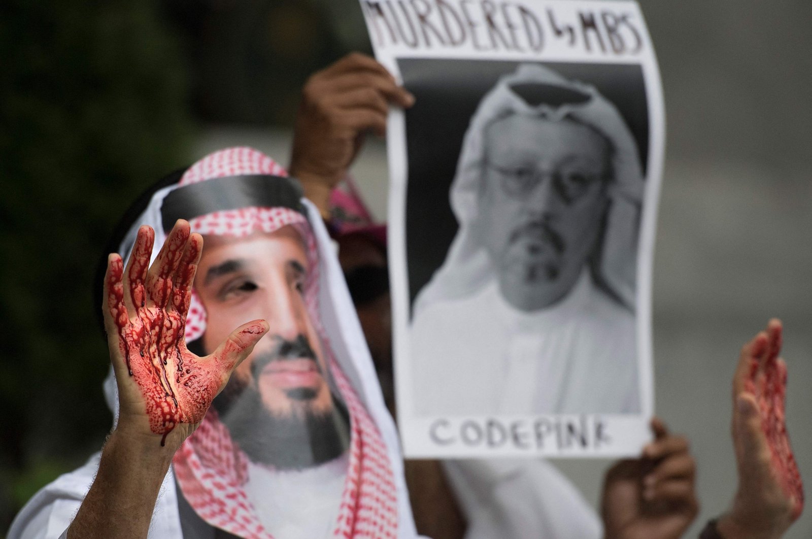 A demonstrator dressed as Saudi Arabian Crown Prince Mohammed bin Salman with blood on his hands protests outside the Saudi Embassy in Washington, D.C., U.S., Oct. 10, 2018. (AFP Photo)