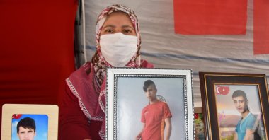 Saadet Ödümlü participates in a sit-in protest on the doorstep of the pro-PKK Peoples' Democratic Party’s (HDP) headquarters in southeastern Diyarbakır province, Turkey, Sept. 11, 2019. (AA Photo)