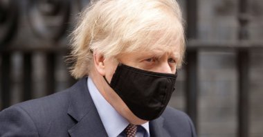 Britain's Prime Minister Boris Johnson walks outside Downing Street in London, Britain, March 3, 2021. (Reuters Photo)