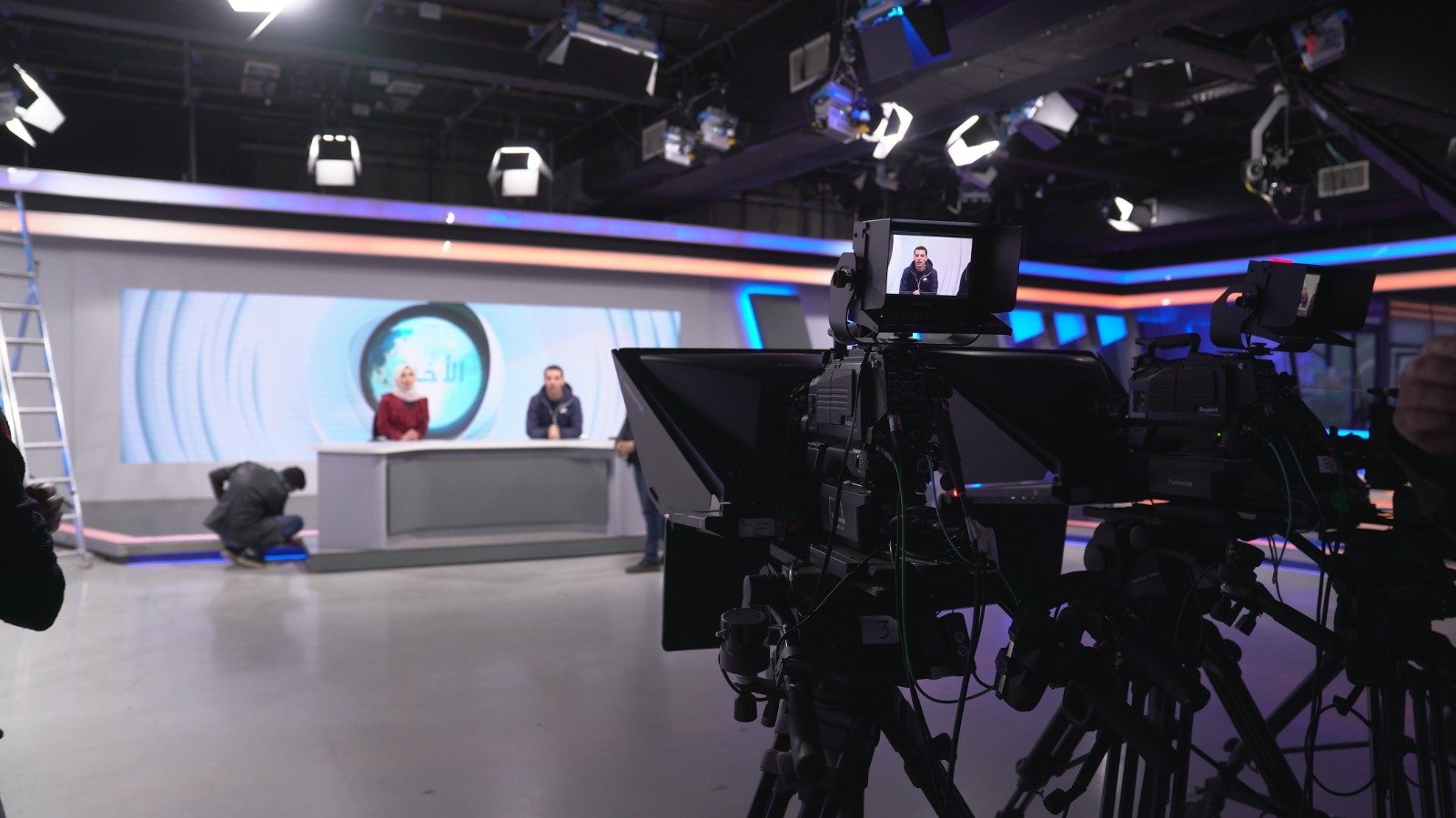 News anchors deliver the news in the Syrian TV headquarters in Istanbul, Turkey. (Archive Photo)