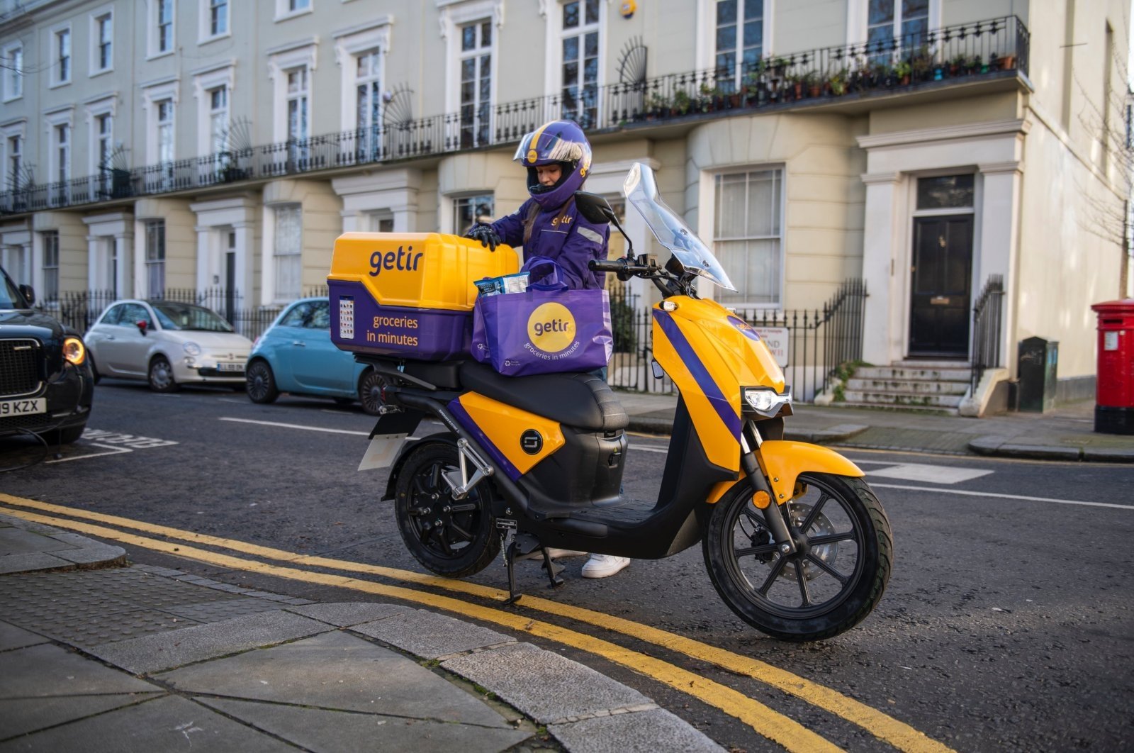 A Getir courier is seen beside his bike, London, U.K., Jan. 27, 2021. (Courtesy of Getir)
