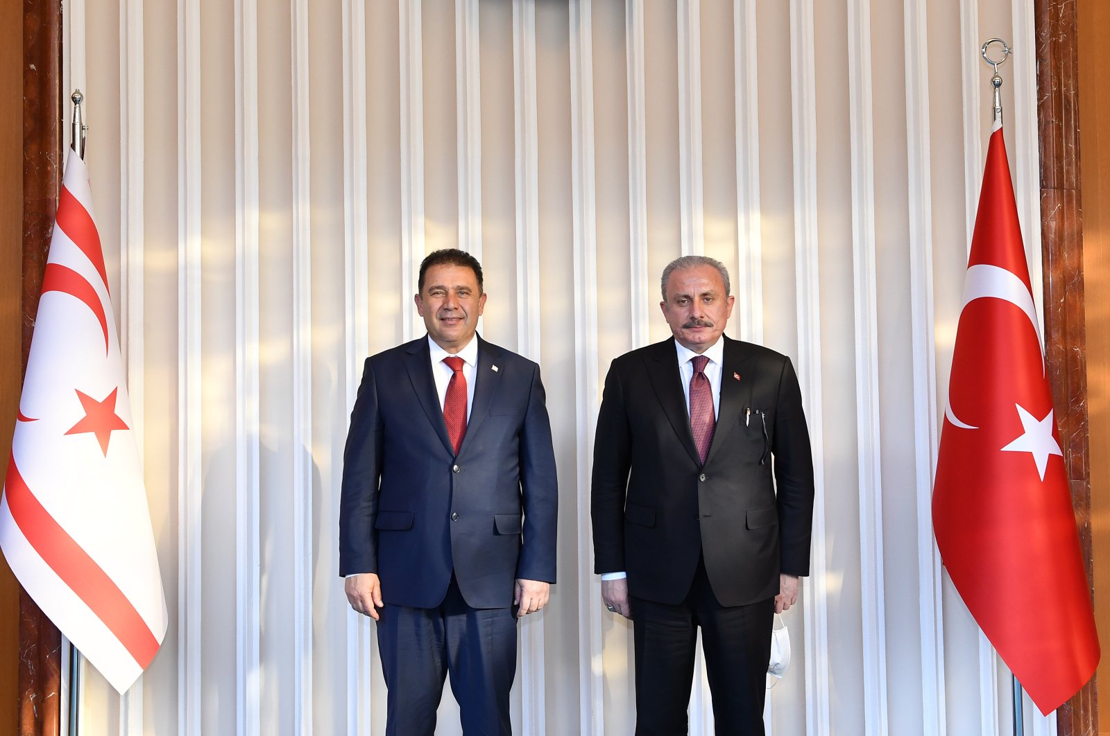 Turkish Republic of Northern Cyprus (TRNC) Prime Minister Ersan Saner (L) and Turkey's Parliament Speaker Mustafa Şentop pose for a photo before a meeting in the capital Ankara, Turkey, March 3, 2021. (AA Photo)