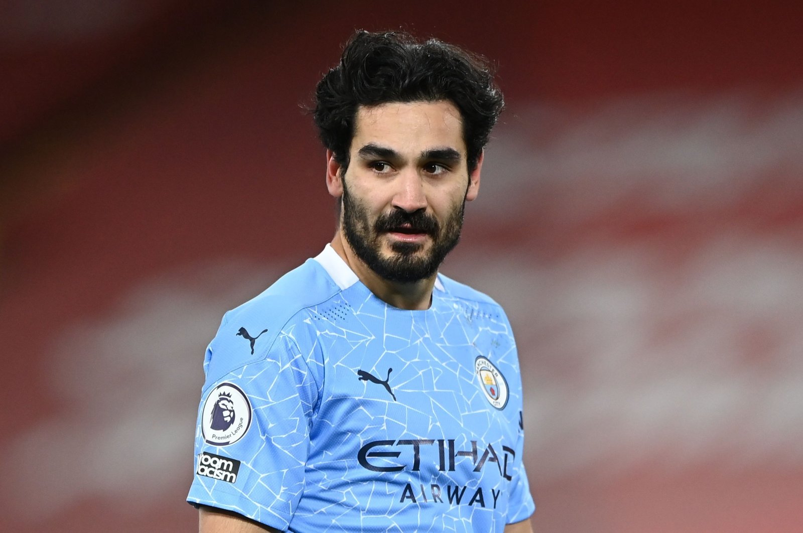  Ilkay Gundogan, a midfielder for Manchester City, playing soccer.