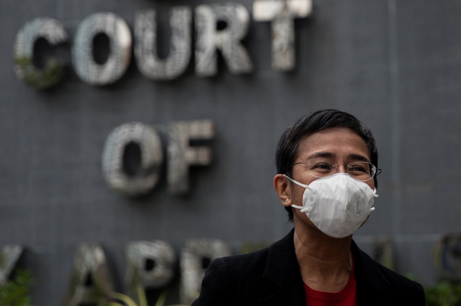 Filipino journalist and Rappler CEO Maria Ressa speaks to the media after testifying before the Court of Tax Appeals in Quezon City, Metro Manila, Philippines, March 4, 2021. (Reuters Photo)