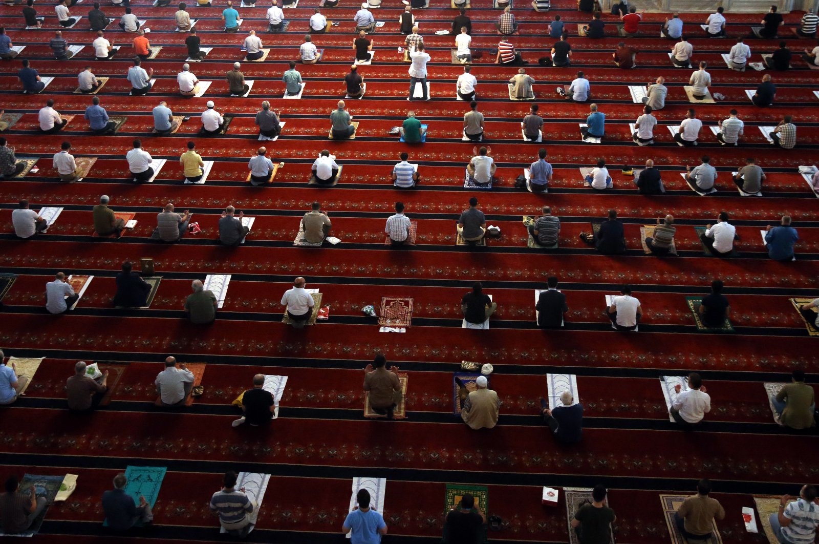 People perform Friday prayers at Kocatepe Mosque, in the capital Ankara, Turkey, June 26, 2020. (PHOTO BY ALİ EKEYILMAZ)