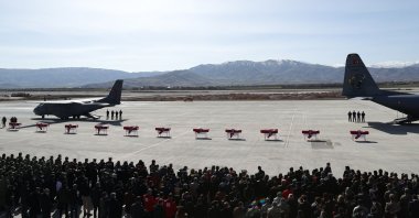 A view of coffins lined on the runway during a military funeral service in Elazığ, eastern Turkey, March 5, 2021. (AA PHOTO)