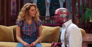 This image released by Disney  shows Elizabeth Olsen (L) and Paul Bettany in a scene from "WandaVision." (AP Photo)