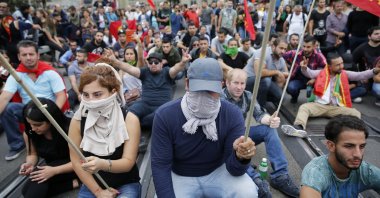 Protesters in Switzerland stage a demonstration on the Kirchenfeld bridge, Bern, Switzerland, Sept. 12, 2015. (AP Photo)
