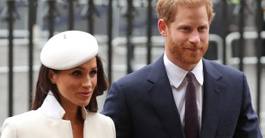 In this file photo, Britain's Prince Harry (R) and Meghan Markle attend a Commonwealth Day Service at Westminster Abbey in central London, on March 12, 2018. (AFP Photo)